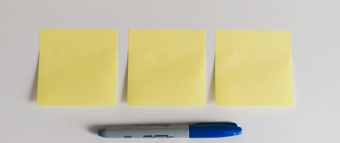 Colorful sticky notes arranged on a wall
